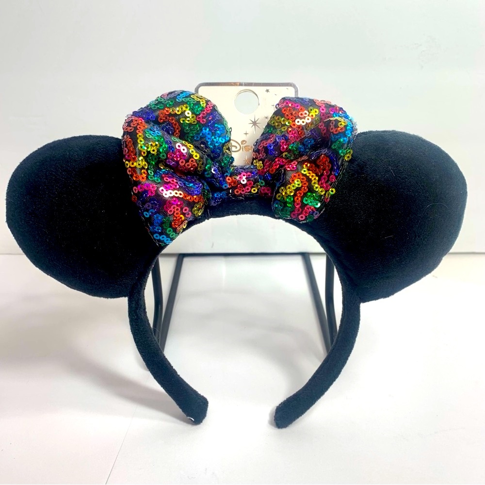 NWT. Disney Primark rainbow bow ears. Adorable headband ears with sequin